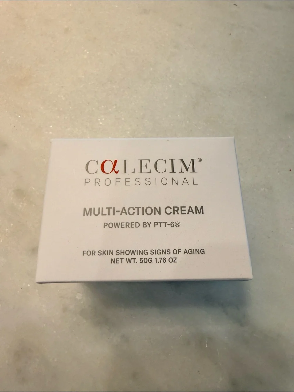 CALE Professional Multi-Action Cream — White and Silver